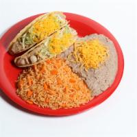 #9. Two Chicken Tacos · Two Soft or Crunchy Shredded Chicken tacos (Chicken cooked with tomato). Tacos with lettuce ...
