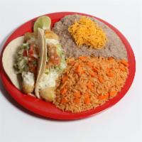 #14. Two Fish Tacos Combination · Two fish tacos, tartar sauce, pico de gallo, lime, cabbage. Rice and beans with cheese on th...