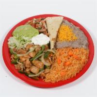 #16. Fajitas Plate Combination · Your choice of chicken or steak fajitas with bell pepper and onion, lettuce, pico de gallo, ...