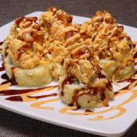 Abre la Boca Mucho Roll · Spicy Immitation crab, grilled shrimp, cream cheese, avocado - tempura style.