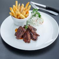 BBQ Marinated Steak Tips · 1/2 lb. marinated steak tips, based with our house BBQ, hand-trimmed and fire grilled to ord...