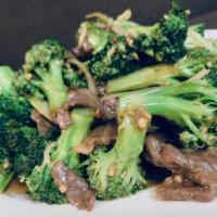 Beef Broccoli · Sliced marinated beef stir fried with fresh garden broccoli in dark seasoned sauce.