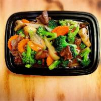 Pad Broccoli Beef · In compliment of fresh-grounded garlic with broccoli, carrots, onions, mushrooms, and tender...