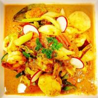 Sea World Curry · Stir-fried with mixed seafood and vegetables in special curry sauce.