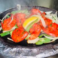 Shrimp Tikka · Marinated in yogurt with Indian spices and broiled in clayoven.
