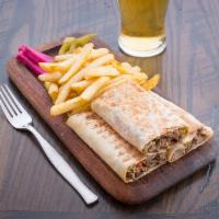 Veal Shawarma Wrap · 100% pure veal meat, spiced and cooked on open flame, with a mix of parsley onions and sumak...