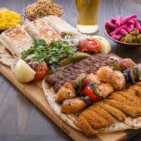 Tray One (Serves 2-3 persons) · 2 skewers kofta kebab, 2 skewers shish taouk, chicken scallop, Veal shawarma, and chicken sh...