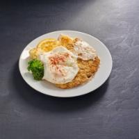 Country Fried Steak and Two Eggs · With hashbrowns and toast or pancakes.