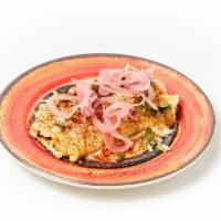 Breakfast Taco · housemade chicken chorizo, local cage free egg, queso (contains: egg, garlic, onion, cilantro)