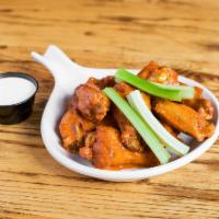 Chicken Wings-6 Pack · Six Jumbo wings tossed in your choice of Buffalo, Honey Garlic, Blackened and Charred, or BB...