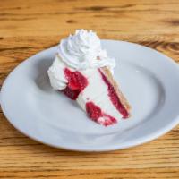 Strawberry Cheesecake · A sweet combination of strawberries and New York style cheesecake nestled in a graham cracke...