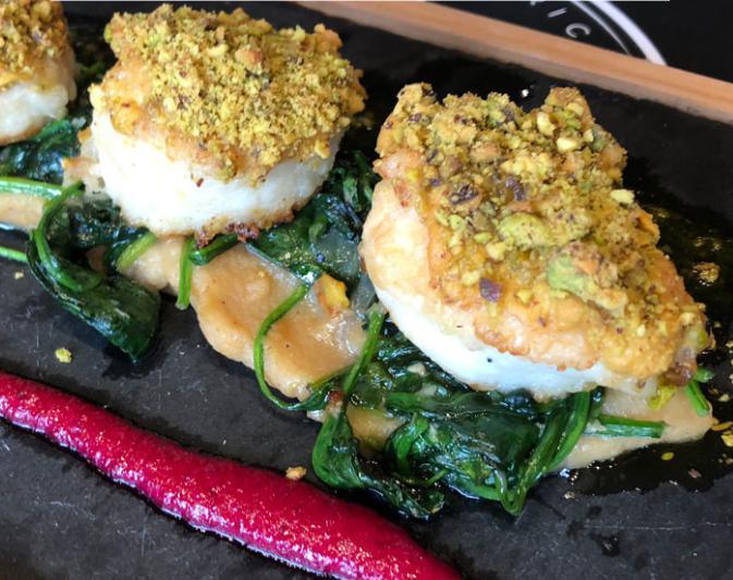 Pistachio Crusted Scallops · Apple parsnip puree, spinach, beet, and horseradish sauce.
