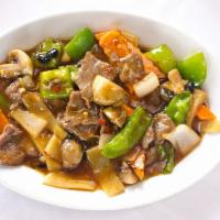 Hunan Beef · Hot. Beef sauteed with mushrooms, snow peas, peppers, bamboo shoots, carrots and onion in a ...