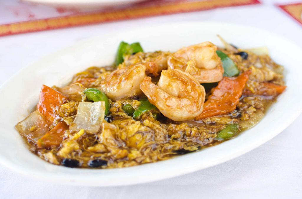 Shrimp with Lobster Sauce · Stir fried shrimp in black beans, bell peppers, garlic, onions and egg flowers in a traditional lobster sauce garnish with green onions.