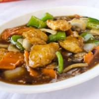 Flounder with Black Bean Sauce · Flounder fish fillets sauteed with green peppers, carrots, white onions, and mushrooms in a ...