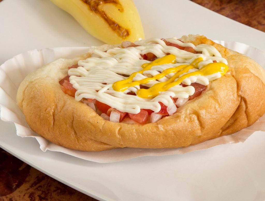 Sonoran Style Hot Dog · Our famous award winning Sonoran style hot dog. Served on our signature bread topped with whole beans, bacon, fresh chopped onions, grilled onions, tomatoes, jalapeno sauce, mustard and mayo.