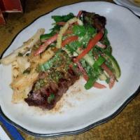 Grilled Skrit Steak · Yuca fries 
Sautéed greens
Chimichurri sauce