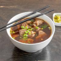 Szechuan Spicy Beef Soup Noodle  · Handmade noodles with stewed beef shank in an aromatic spicy broth. 