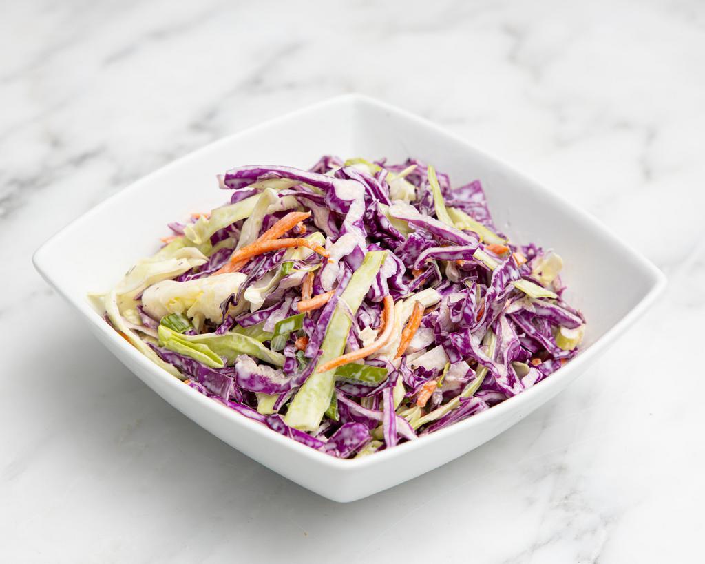 Side Coleslaw · Mixed cabbage, carrot, green onion, and homemade apple cider slaw. 