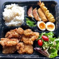 Chicken Karaage Bento · Main dish: chicken karaage and gyoza, vegetable spring roll, tempura shrimp, softboiled egg,...
