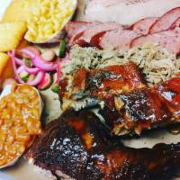 Party Platter · 1/2 chicken, 1/2 lb. sausage, 1/2 lb. brisket, 1/2 lb. pulled pork (No substitution), and ch...