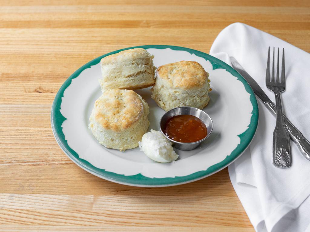 Buttermilk Biscuits · With honey butter and tomato jam.