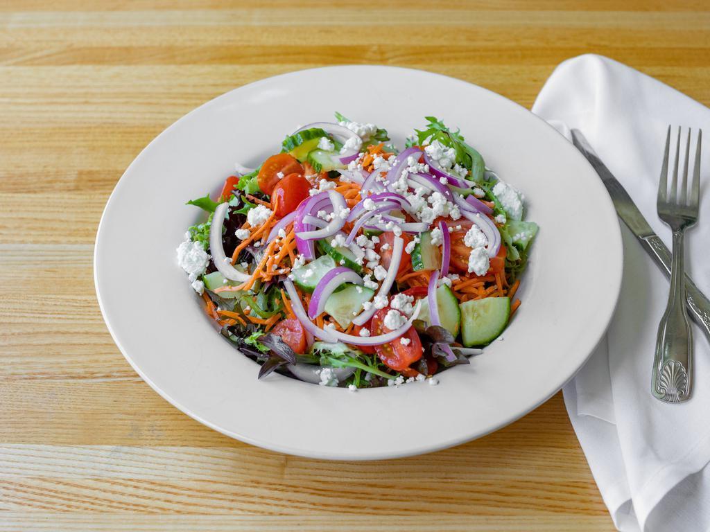 Simply Green Salad · Artisan greens, goat cheese, cucumber, cherry tomatoes, red onion, carrots and black pepper balsamic.