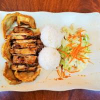 C9. Chicken & Gyoza Combo · Marinated chicken grilled and served with our own homemade teriyaki sauce along with 5 piece...