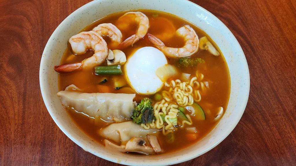 Prawn Ramyon · Hot noodle soup with shrimp, boiled egg, dumplings, and various vegetables.