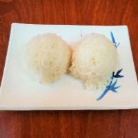 S2. Steamed Rice · 2 extra scoops of warm steamed white rice.