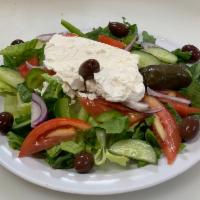  Greek Salad · Romaine lettuce, onions, tomatoes, green peppers, cucumbers, feta cheese, Kalamata olives an...