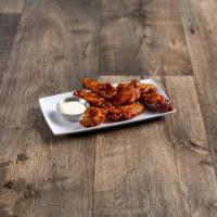 Six Chicken Wings · Comes with choice of dressing.