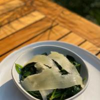 Popeye · sautéed garlic spinach with red pepper flakes, fresh lemon juice, and topped with shaved par...