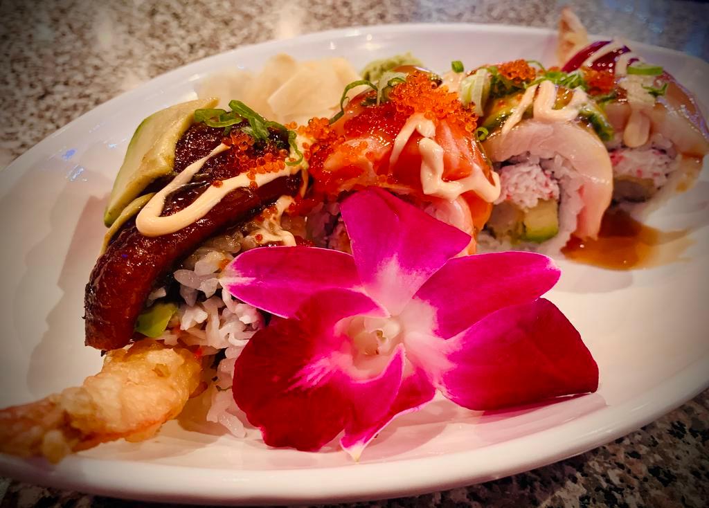 8 Pieces S. San Jose Roll · Inside: shrimp tempura, avocado and crab. Outside: tuna, salmon, ebi, unagi, tai, tobiko and green onion.