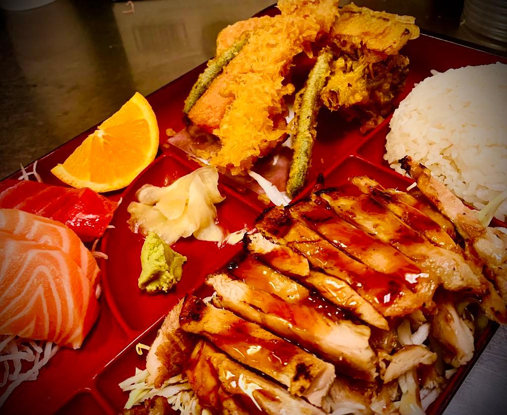 D29. Sashimi, Tempura and Chicken Bento Box Dinner · 1 piece tuna, 2 pieces salmon.
