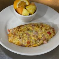DENVER OMELETTE · Cheddar, Ham, Green Pepper, Onion. Served w/ Hash Browns or Fruit & Toast or Pancakes