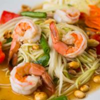 28. Som Tum Salad (Papaya Salad) · Shredded papaya, prawns, green beans, tomatoes, fresh chilies, lime juice, dried shrimp and ...