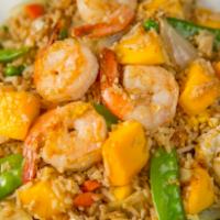 33. Mango Fried Rice · Stir-fried jasmine rice with egg, onion, mango, snow peas and assorted vegetables. Your choi...