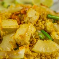 35. Curry Fried Rice · Stir-fried jasmine rice with egg, onion, curry powder, pineapple and cashew nuts. Your choic...