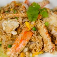 36. Crab Fried Rice · Stir-fried jasmine rice with crab meat, egg, onion and assorted vegetables.