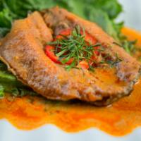 41. Crispy Trout Curry · Deep-fried boneless trout topped with panang curry, bell pepper and basil.