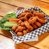 Trio Basket  · Delicious zucchini, mushrooms and onion rings fried in our special beer batter. Your choice ...