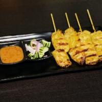 5. Satay Chicken · Grilled marinated chicken served with peanut-sauce and cucumber salad.