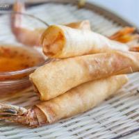6. Prawns Rolls · Deep fried shrimps wrapped in rice paper served with plum sauce