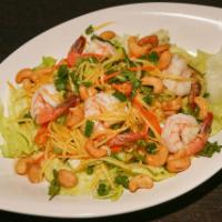 24. Mango Prawn Salad · Shredded mango tossed with carrots, cashew nuts, onions and lime juice.