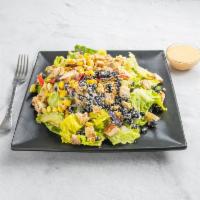 South of The Border Salad · Romaine lettuce, cilantro, avocado, season grilled chicken breast, crunchy onions, tortilla ...