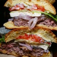 Traditional Burger · Served with lettuce, tomato and onion.