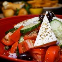 Greek Salad (gf) · Lettuce, tomato, red onions, capers, olives, cucumber, feta, oregano, lemon vinaigrette.