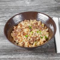 Beef Bulgogi Fried Rice · Stir-fried white rice with onions, scallions and beef bulgogi. Add an egg for an additional ...