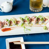 Gemini Roll · Raw. Crab meat and spicy tuna inside. Topped with tuna, avocado and our honey wasabi sauce. 